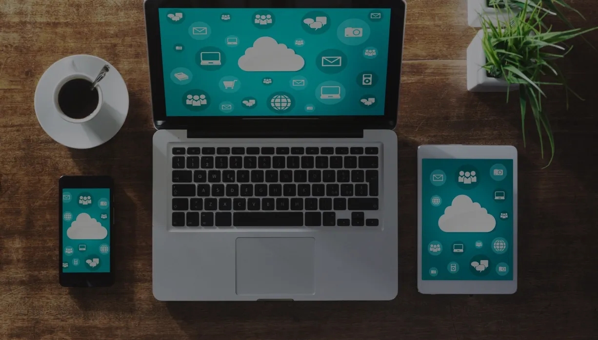 Image showing a laptop with a hotel web application interface, featuring booking, room management, and customer service functionalities.